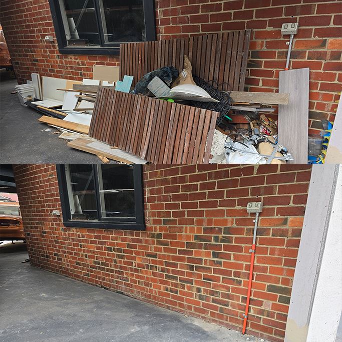 Household rubbish piled beside a brick home in Melbourne