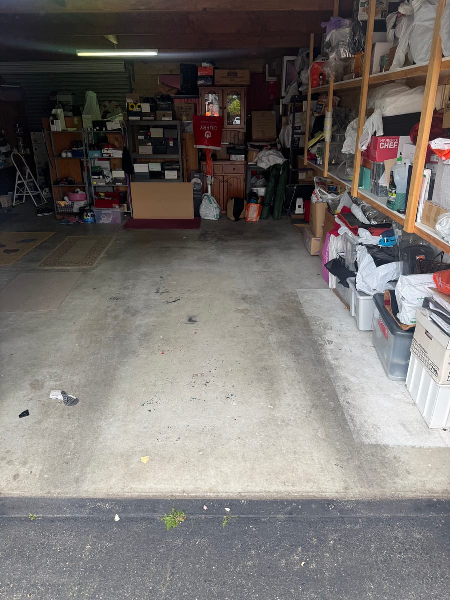 Empty garage floor after a garage cleanout in Melbourne