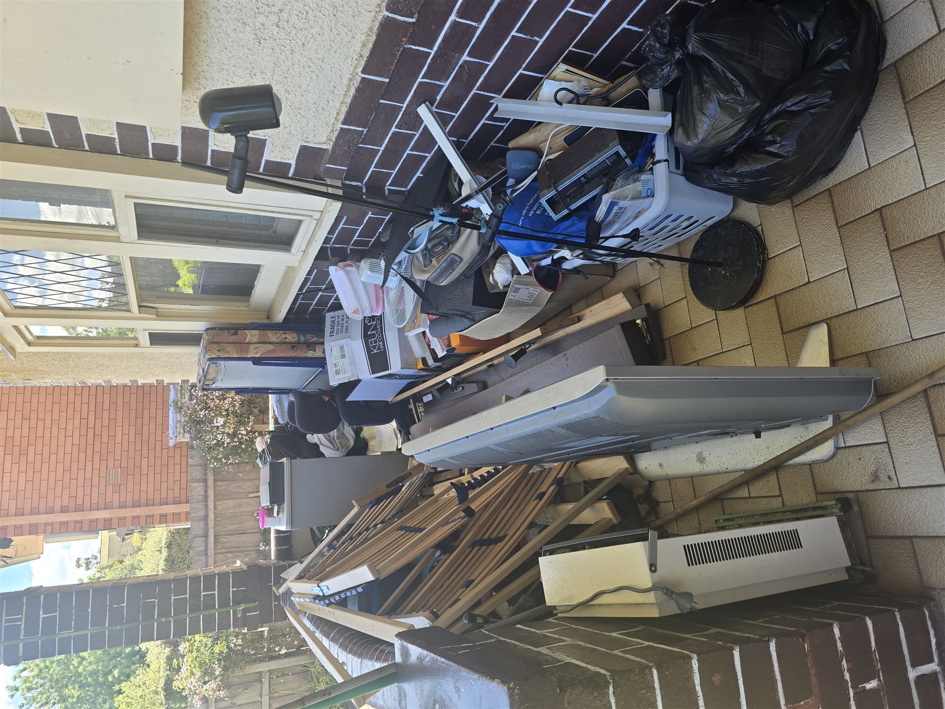Porch piled high with junk