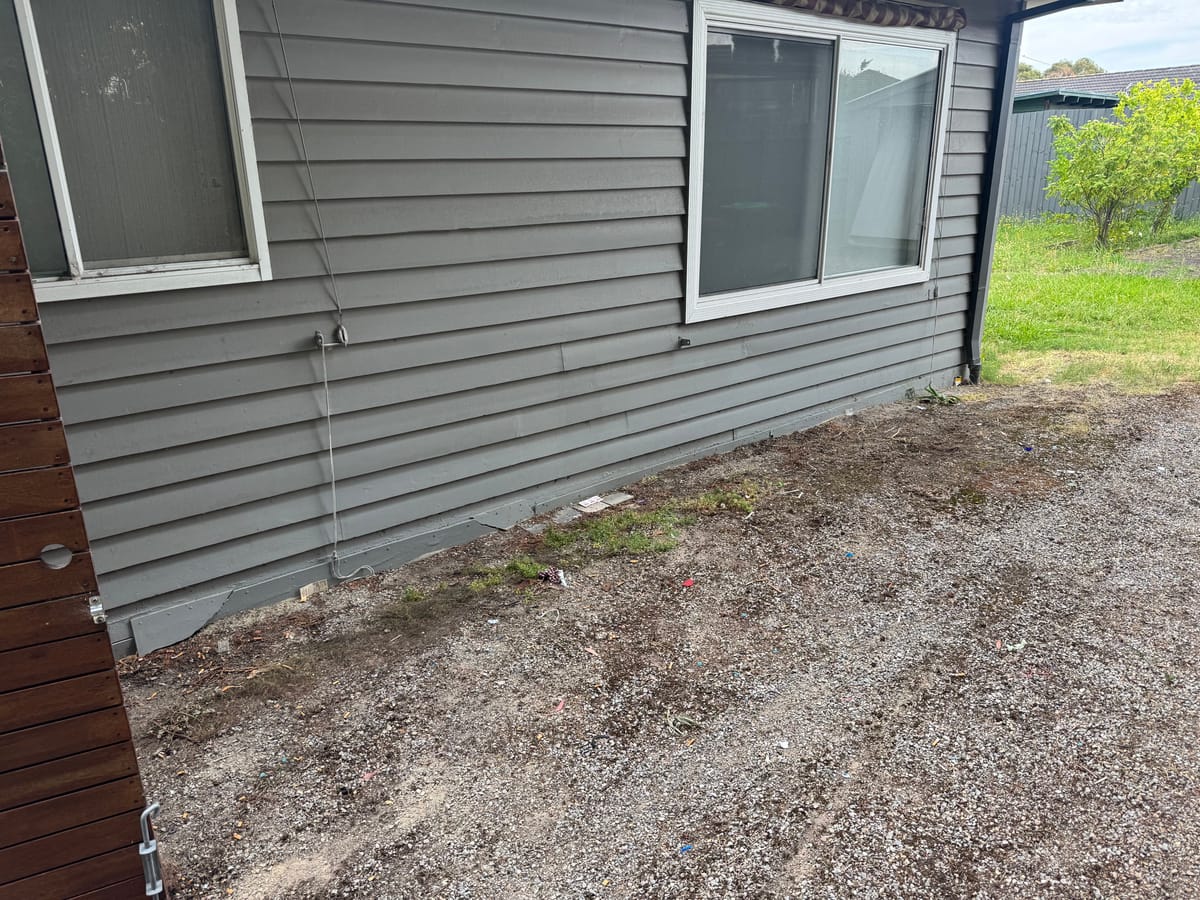 Clean front lawn after full household rubbish removal in Melbourne