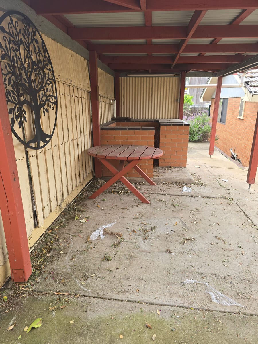 Cleared timber-deck patio after furniture and junk removal in Melbourne