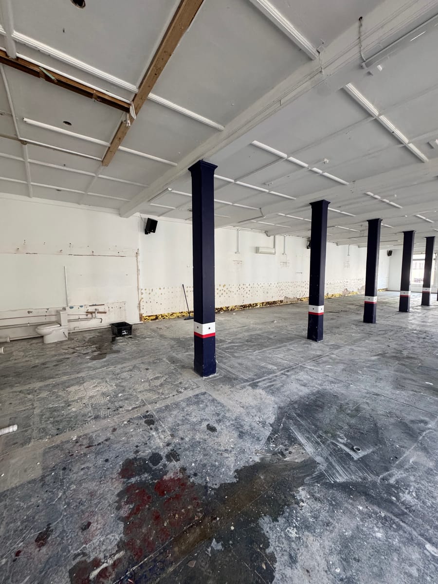 Clean empty warehouse floor after commercial rubbish removal in Melbourne