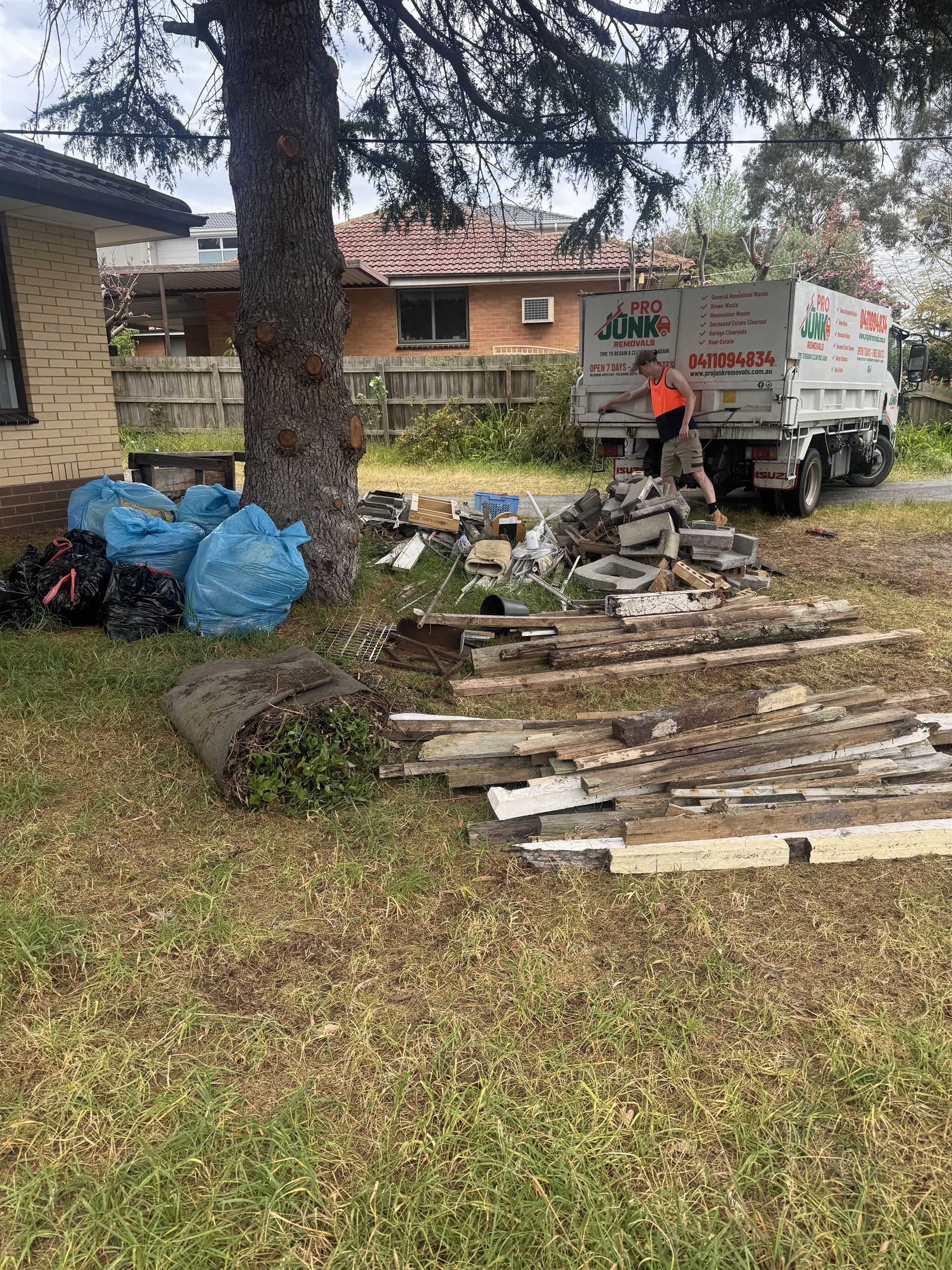 Yard full of old timber and renovation waste